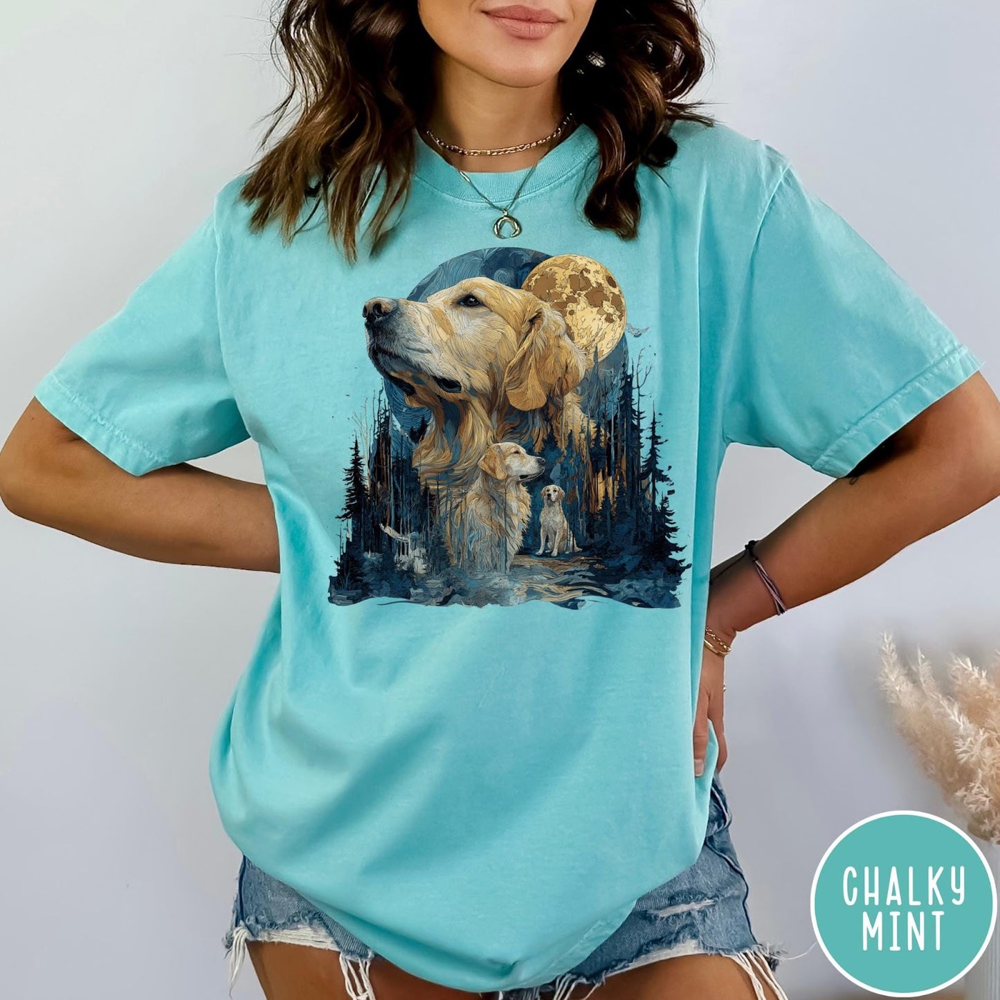 Comfort Colors tee in Chalky Mint featuring artistic graphic design of Golden Retrievers in a moonlit forest scene