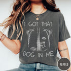 Comfort Colors tee in Pepper featuring graphic style X-ray ribcage with a small dog sitting inside.