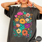 Comfort Colors tee in Pepper featuring boho style floral graphic with vibrant orange, pink, and purple flowers