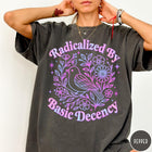 Comfort Colors tee in Pepper featuring floral design style with a bird and flowers graphic print
