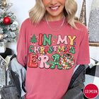 Comfort Colors tee in Crimson featuring Christmas disco style graphic with festive tree and colorful disco ball