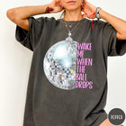 Comfort Colors tee in Pepper featuring disco ball graphic with text Wake Me When The Ball Drops