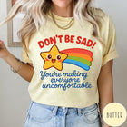 Comfort Colors tee in Butter featuring cute shooting star graphic with Don't Be Sad text