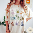 Comfort Colors tee in Ivory featuring vintage retro style graphic of nine kittens doing various daily activities