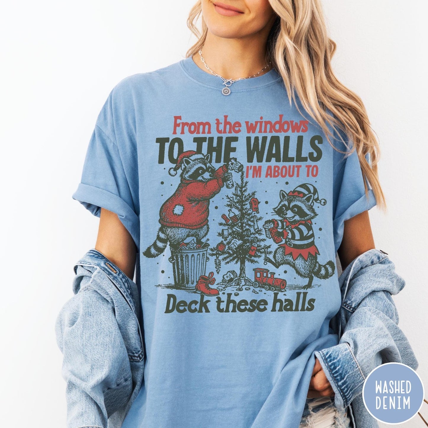 Comfort Colors tee in Washed Denim featuring vintage style graphic of two raccoons decorating a Christmas tree