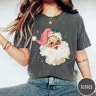 Comfort Colors tee in Pepper featuring retro Christmas style graphic of a smiling Santa Claus with pink hat