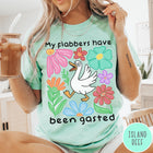 Comfort Colors tee in Island Reef featuring playful cartoon style graphic of a goose surrounded by colorful flowers
