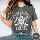 Comfort Colors tee in Pepper featuring skeleton graphic with checkered circle and If I Had Feelings text