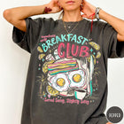 Comfort Colors tee in Pepper featuring breakfast food graphic with bacon, eggs, coffee, and palm trees.