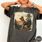 Comfort Colors tee in Pepper featuring vintage style graphic of a German Shepherd sitting in a forest