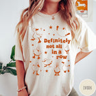 Comfort Colors tee in Ivory featuring whimsical duck design with scattered stars and text about ducks.