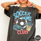 Comfort Colors tee in Pepper featuring soccer mom lifestyle graphic with soccer ball, cleats, and iced coffee