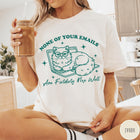 Comfort Colors tee in Ivory featuring screen print graphic of a grumpy cat wearing glasses on a laptop