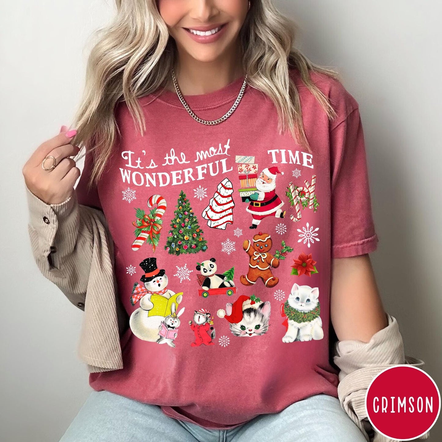 Comfort Colors tee in Crimson featuring Christmas collage graphic with Santa, snowman, animals, and holiday icons