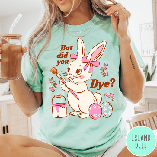 Comfort Colors tee in Island Reef featuring cute Easter bunny graphic with paintbrush and painted Easter eggs.