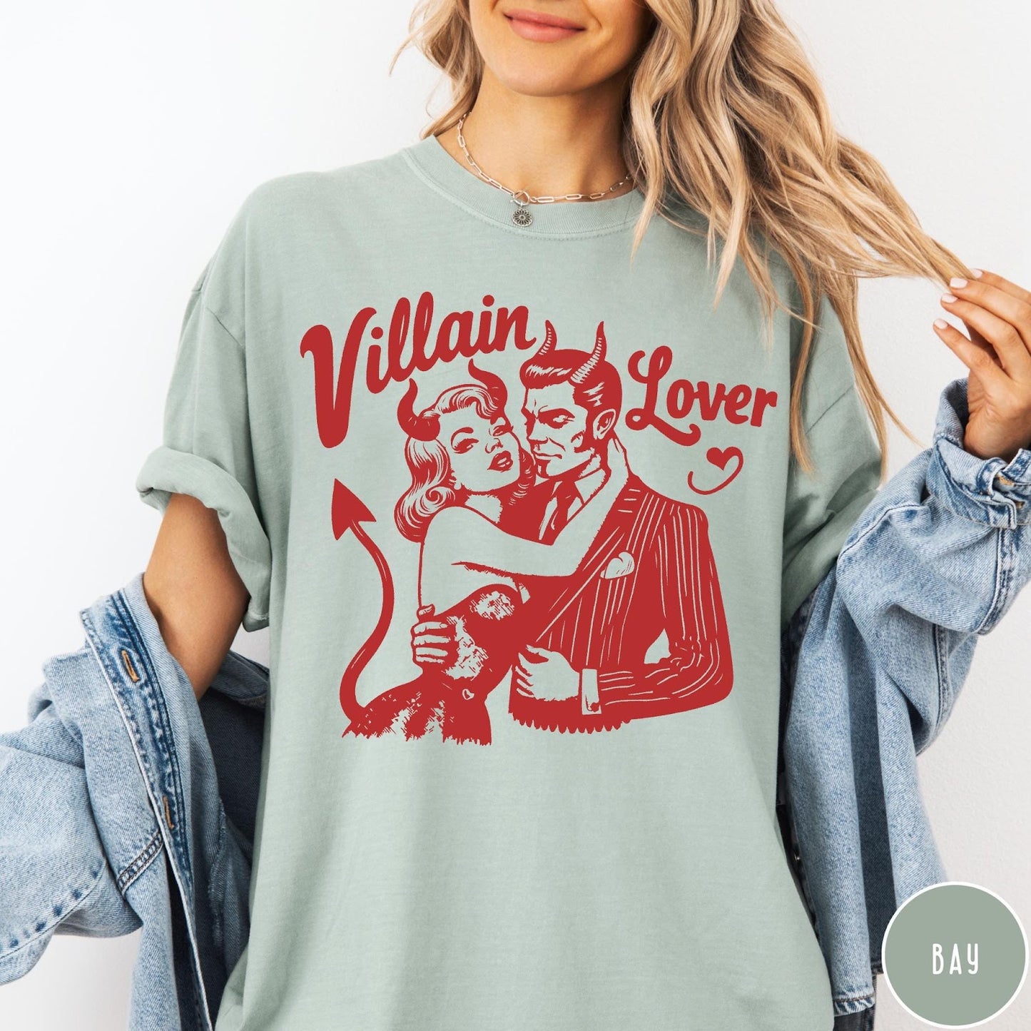 Comfort Colors tee in Bay featuring vintage style graphic of a devilish couple embracing each other