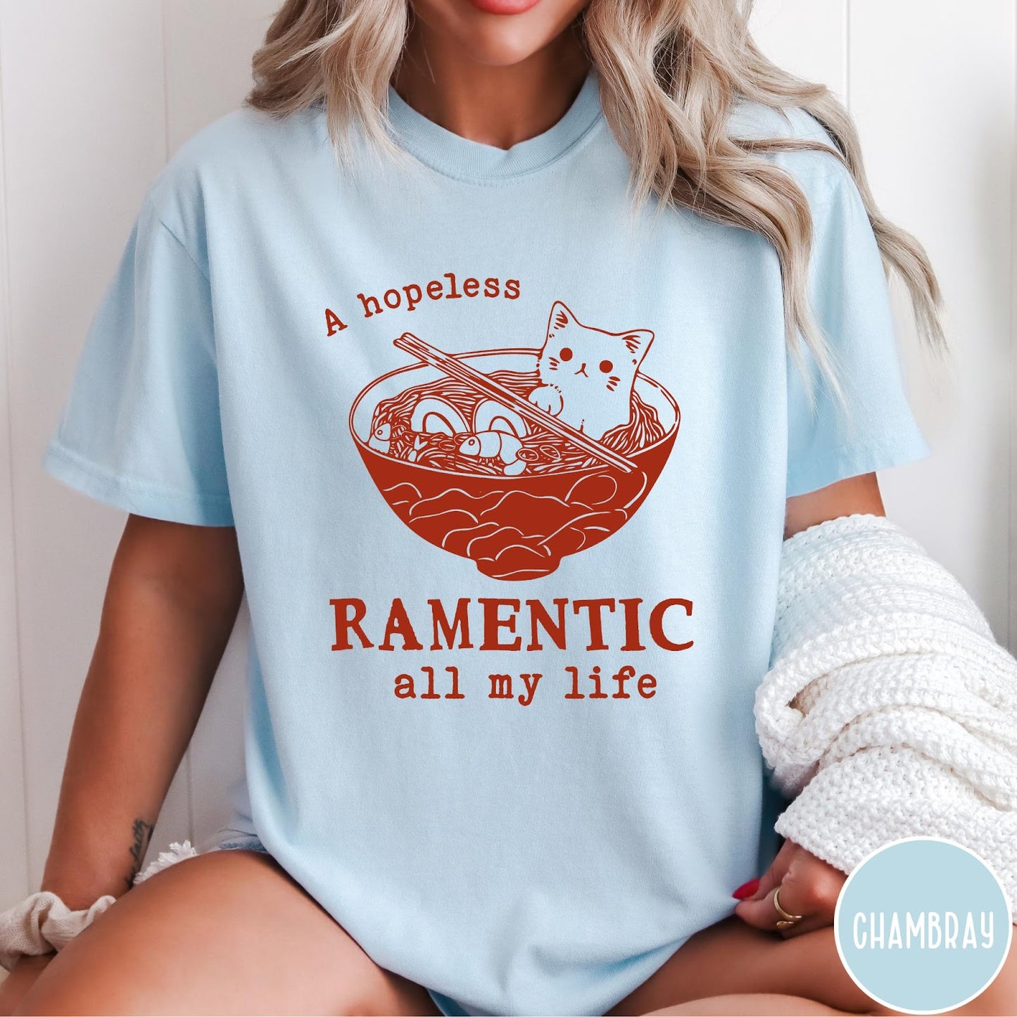 Comfort Colors tee in Chambray featuring line art graphic of a cute cat inside a ramen bowl