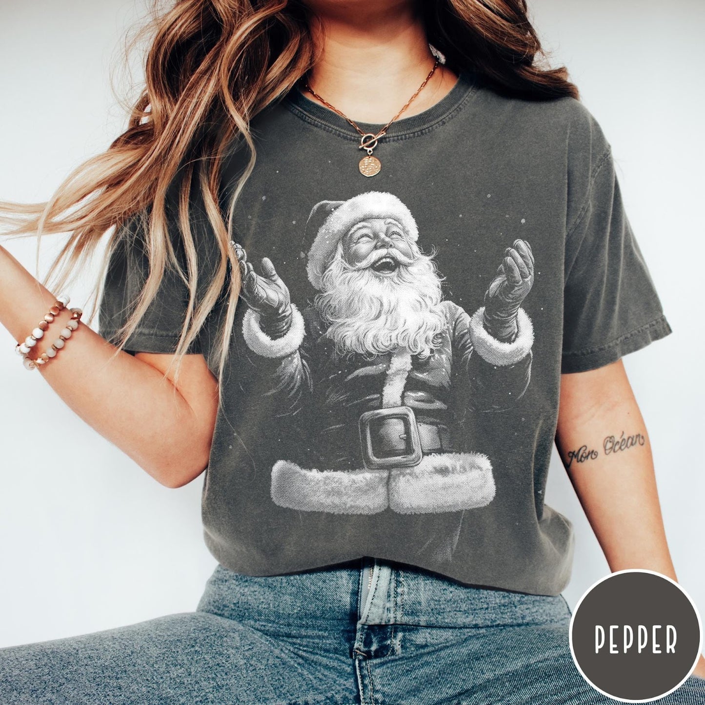 Comfort Colors tee in Pepper featuring vintage style graphic of a laughing Santa Claus with open arms