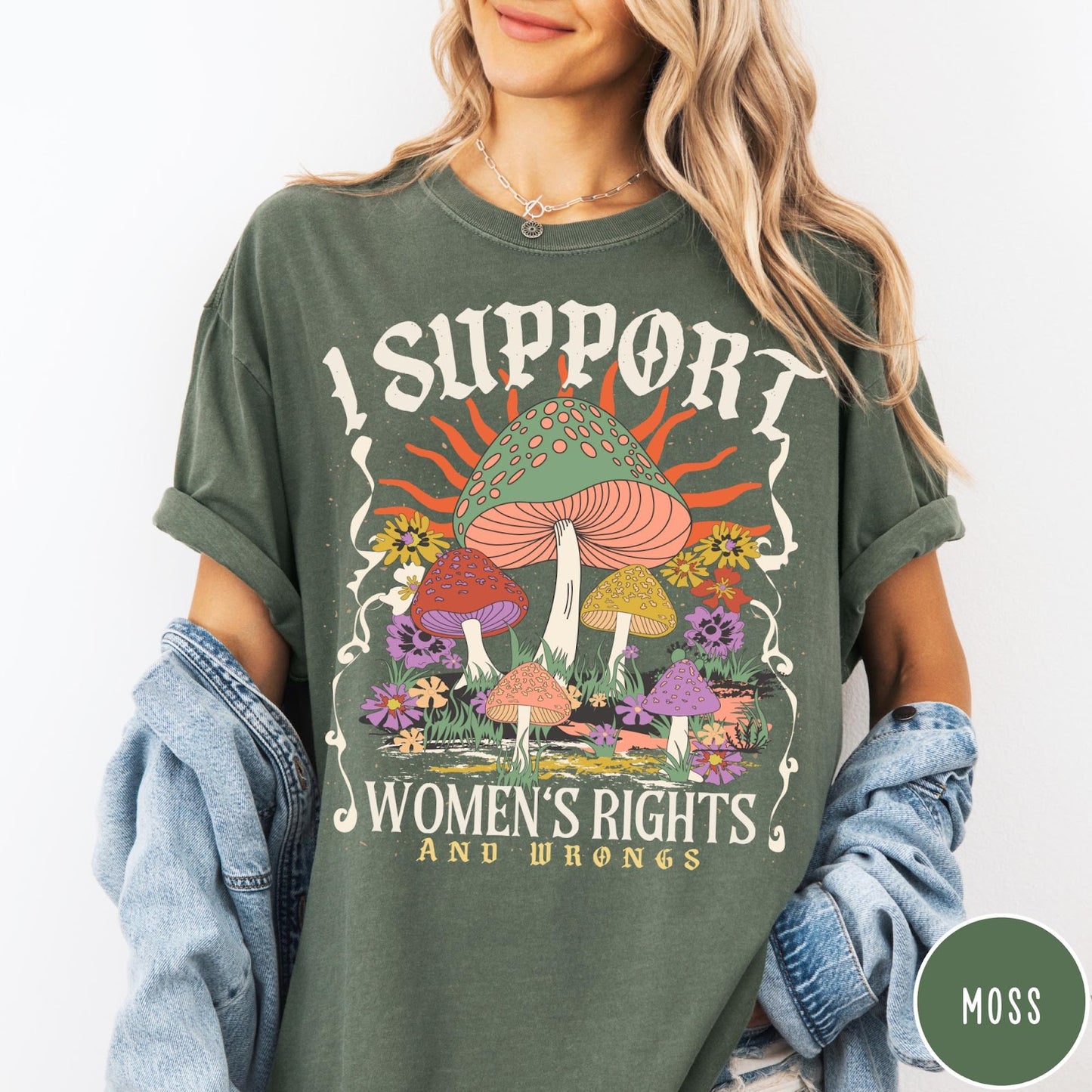 Comfort Colors tee in Moss featuring retro style graphic with mushrooms, flowers, and sun with inspirational text