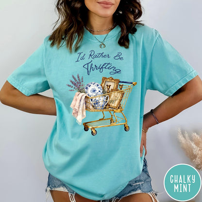Comfort Colors tee in Chalky Mint featuring vintage decor graphic of a shopping cart filled with thrifted items