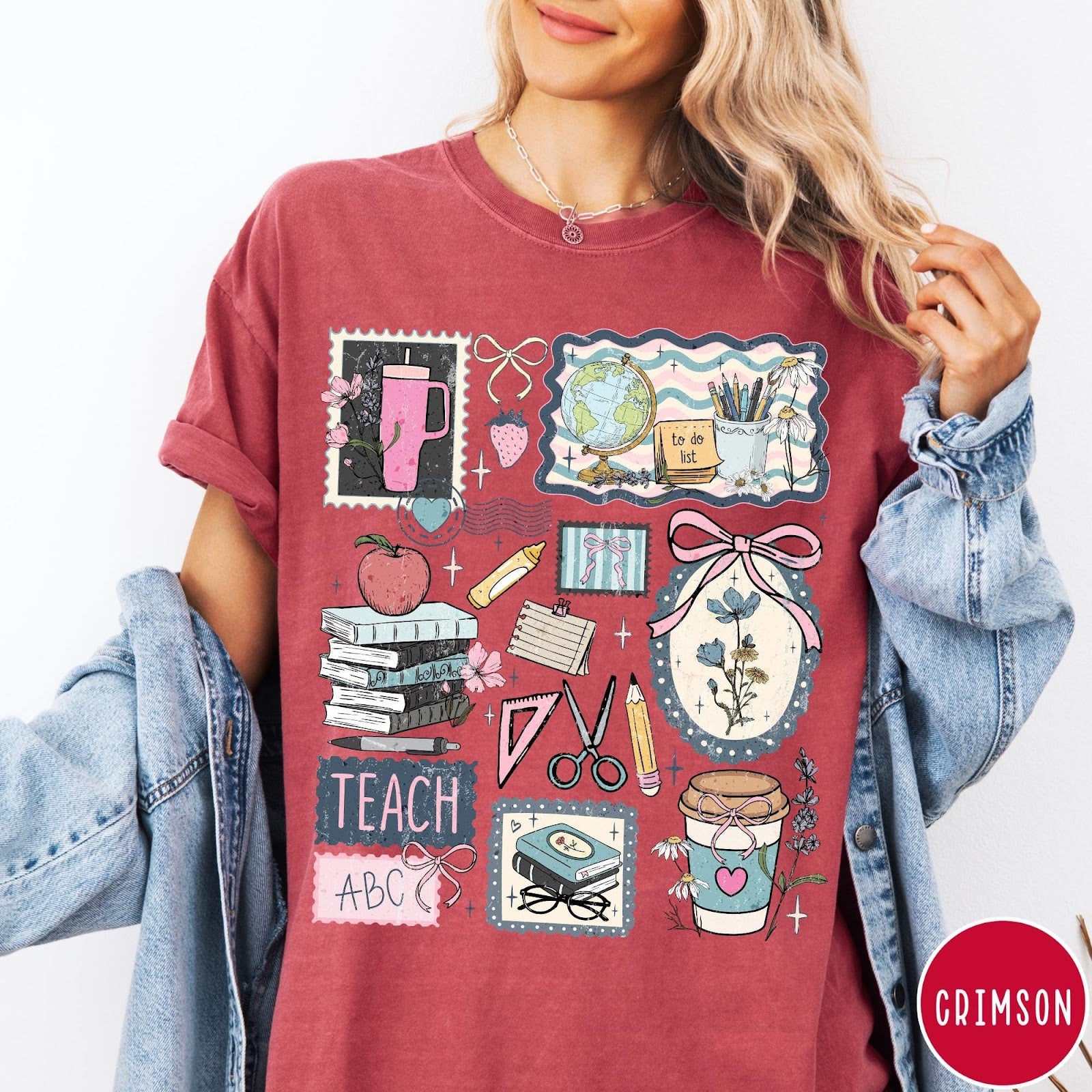 Comfort Colors tee in Crimson featuring collage style graphic with school supplies, books, and teacher life elements