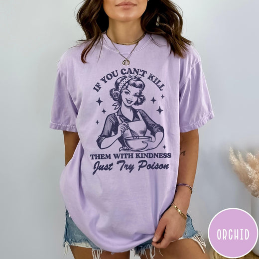 Comfort Colors tee in Orchid featuring retro housewife design with a woman whisking a bowl and text