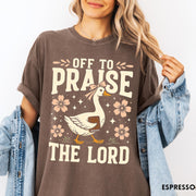Comfort Colors tee in Espresso featuring retro style graphic of a goose wearing a bow holding a book