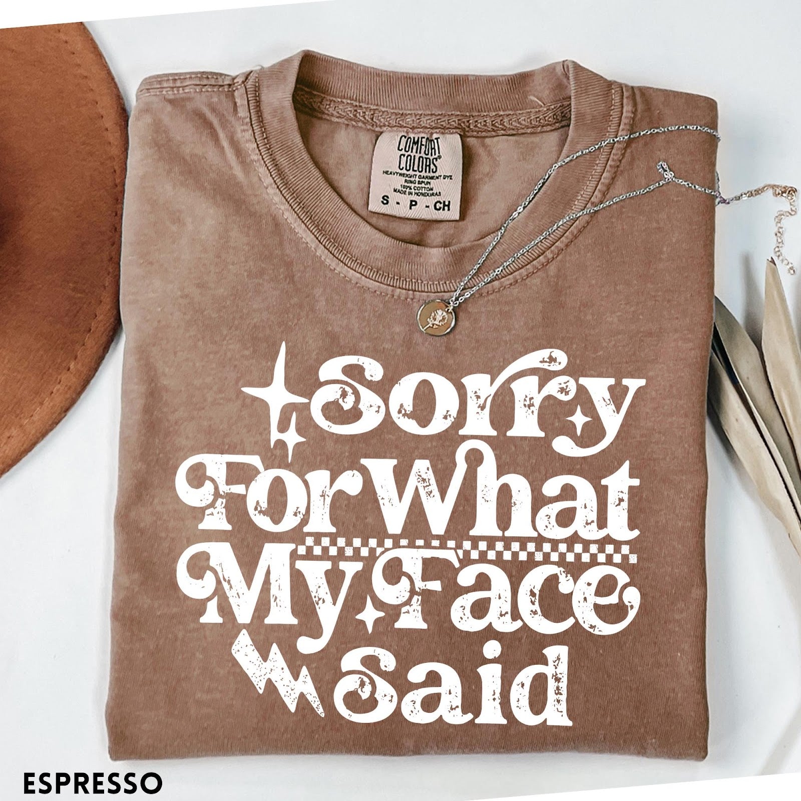 Comfort Colors tee in Espresso featuring sarcastic expression graphic with Sorry For What My Face Said text