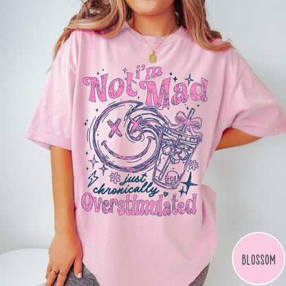 Comfort Colors tee in Blossom featuring retro graphic design with smiley face and iced coffee cup illustration