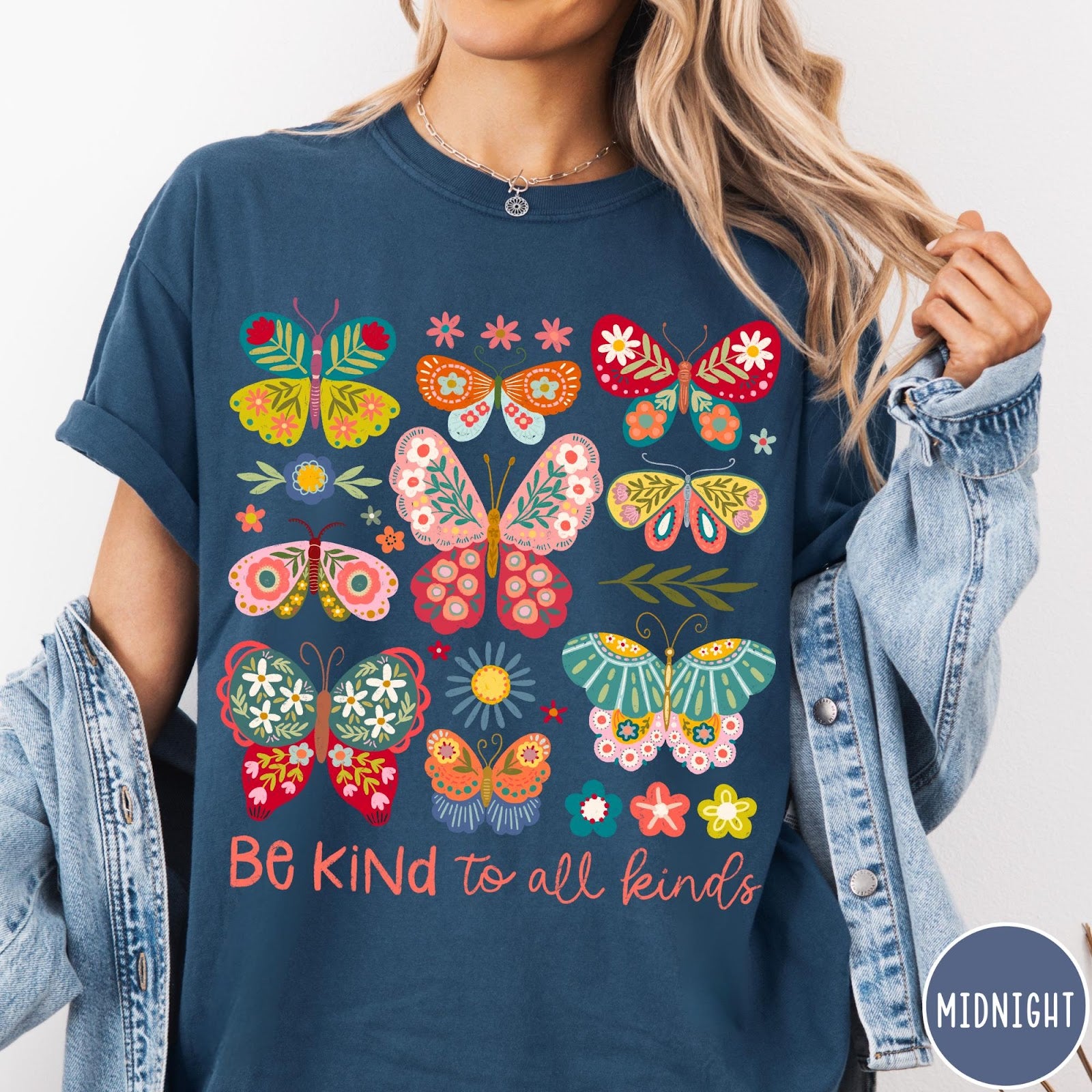 Comfort Colors tee in Midnight featuring colorful butterfly and floral graphic with Be Kind to all kinds text