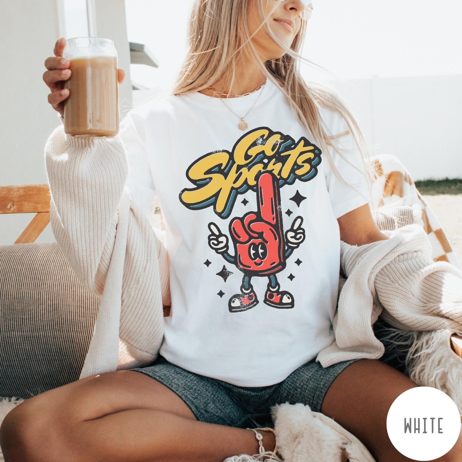 Comfort Colors tee in White featuring retro mascot design with a red foam finger and Go Sports text