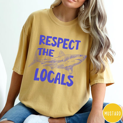 Comfort Colors tee in Mustard featuring sketch style shark graphic with Respect the Locals text design