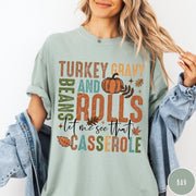 Comfort Colors tee in Bay featuring vintage style Thanksgiving graphic with turkey, gravy, rolls, and casserole text