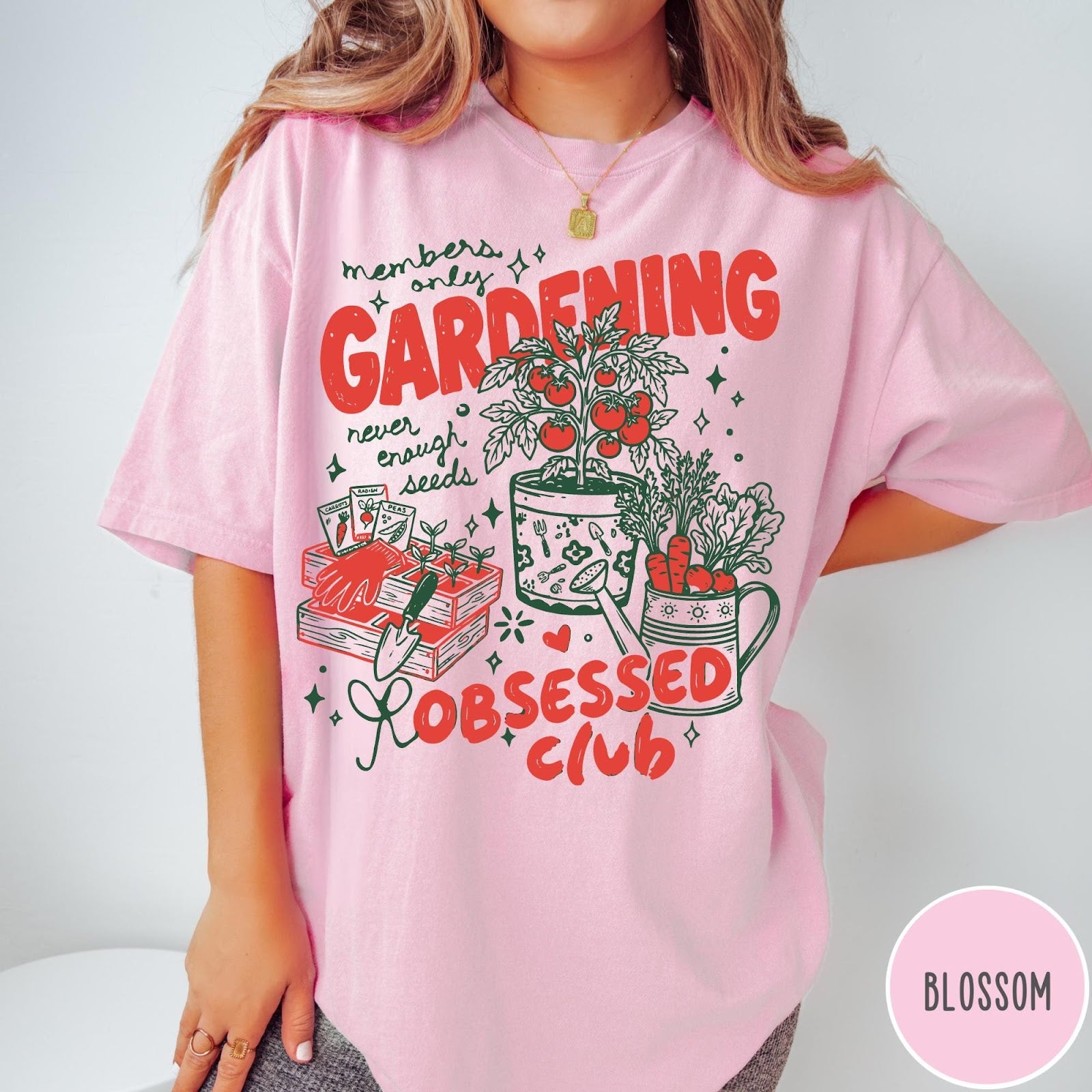 Comfort Colors tee in Blossom featuring retro graphic gardening design with plants, tools, and seeds