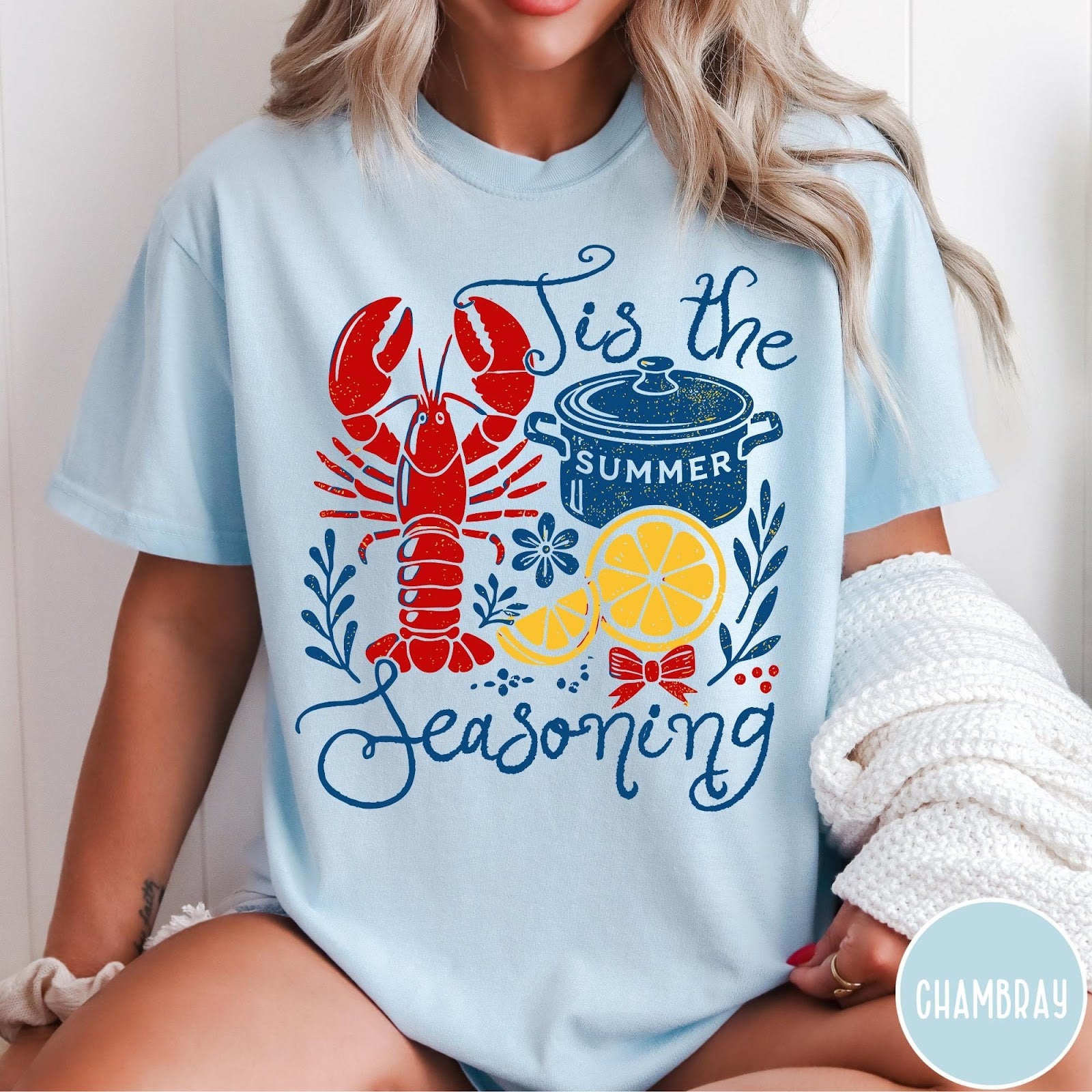 Comfort Colors tee in Chambray featuring lobster boil graphic with a lobster, cooking pot, and lemon slices.