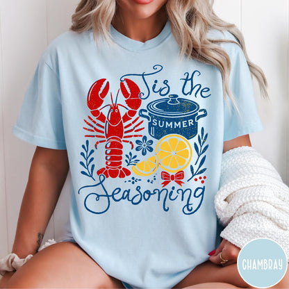 Comfort Colors tee in Chambray featuring lobster boil graphic with a lobster, cooking pot, and lemon slices.