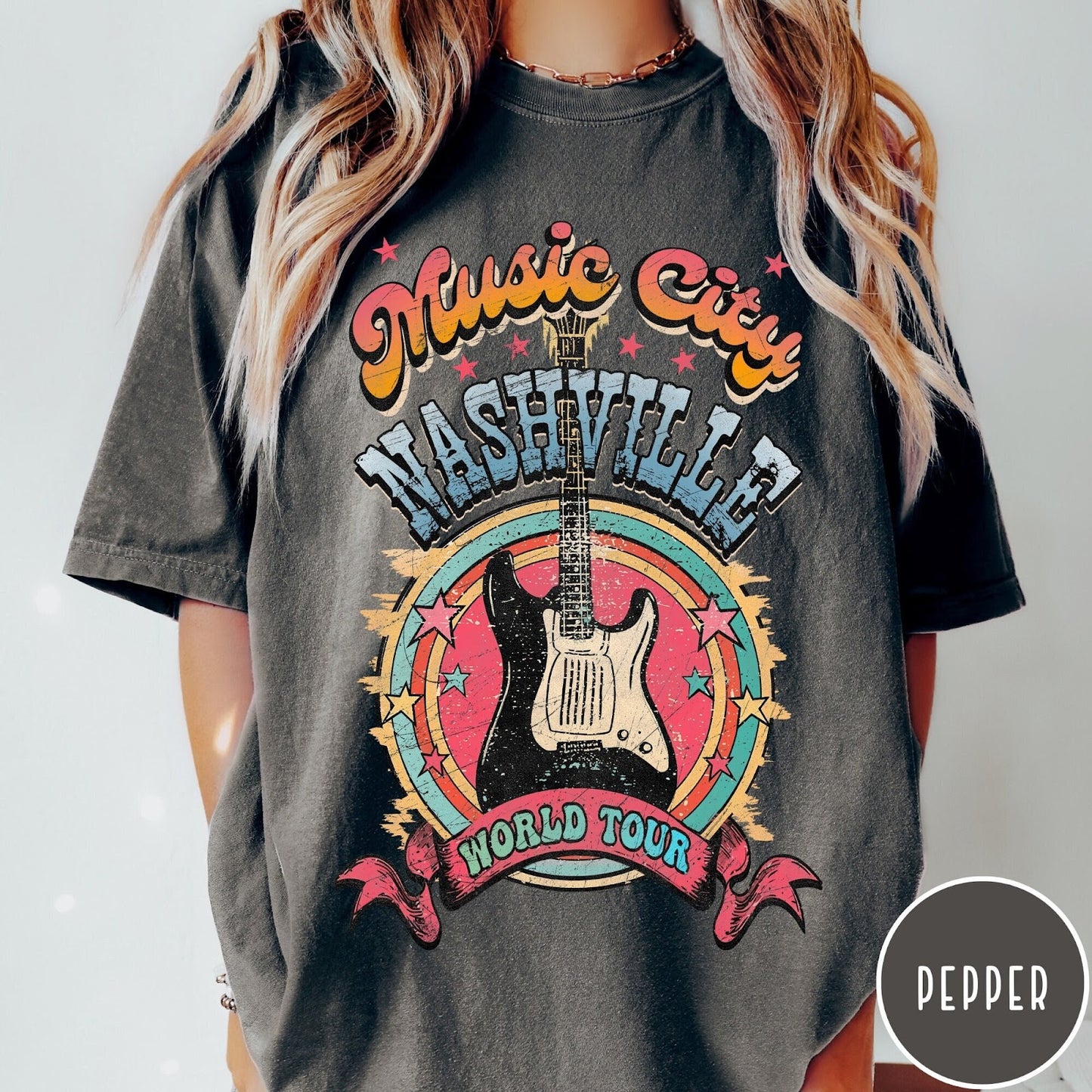 Comfort Colors tee in Pepper featuring retro style Nashville Music City guitar graphic with colorful circular design