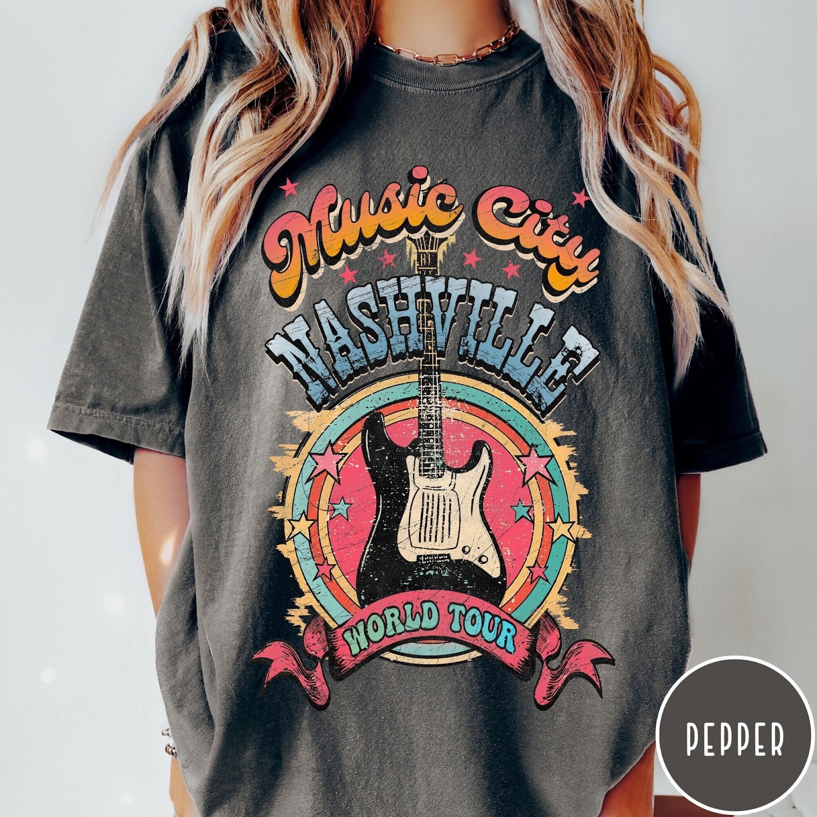 Comfort Colors tee in Pepper featuring retro style Nashville Music City guitar graphic with colorful circular design