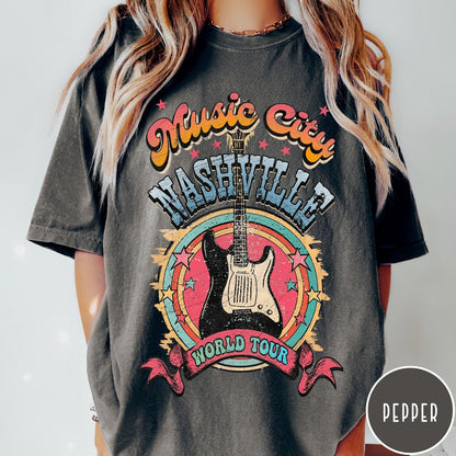 Comfort Colors tee in Pepper featuring retro style Nashville Music City guitar graphic with colorful circular design