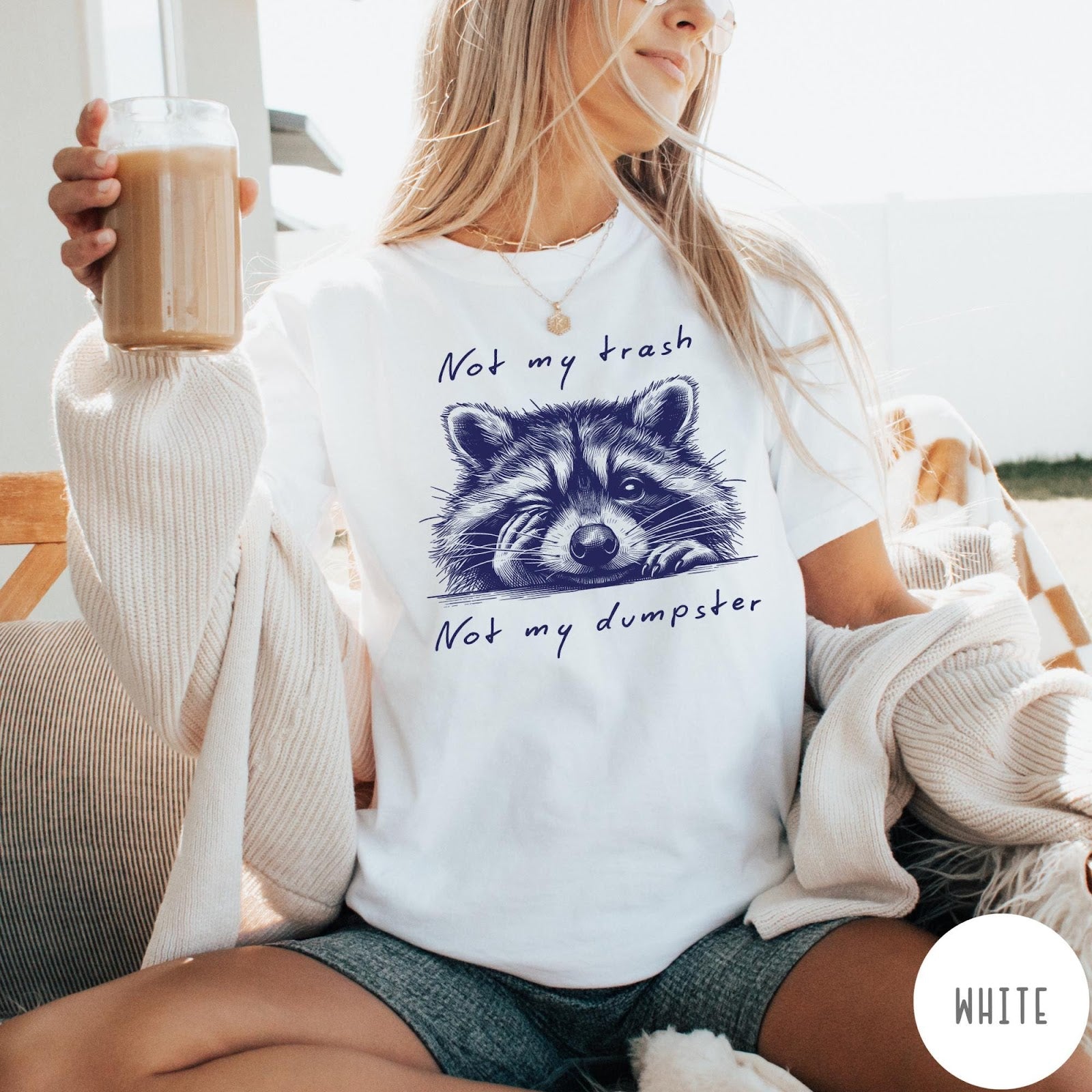Comfort Colors tee in White featuring illustrated style graphic of a winking raccoon with text not my trash