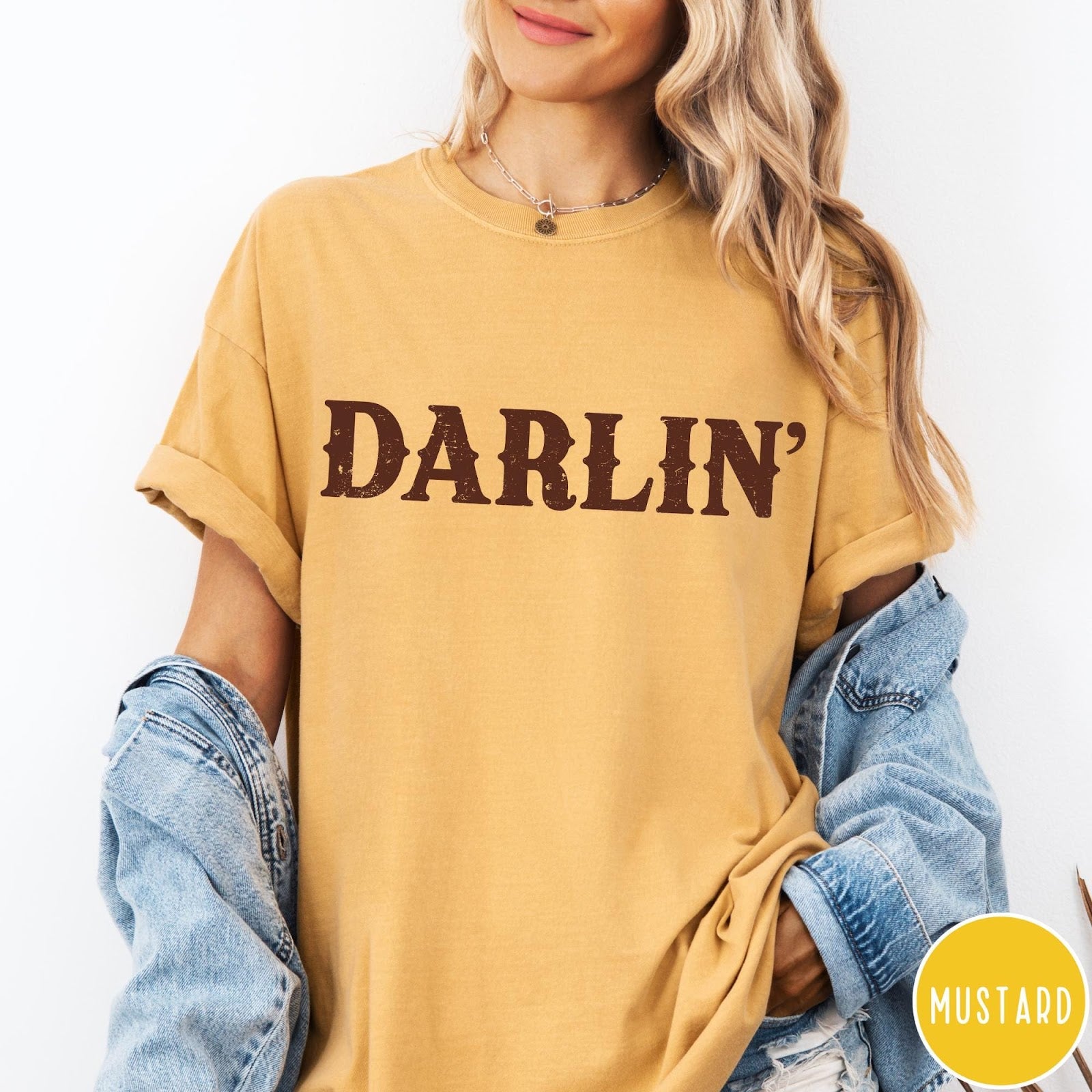 Comfort Colors tee in Mustard featuring western typography with the word Darlin' in a distressed brown font
