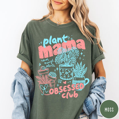 Comfort Colors tee in Moss featuring retro style graphic with potted plants and Plant Mama Obsessed Club text