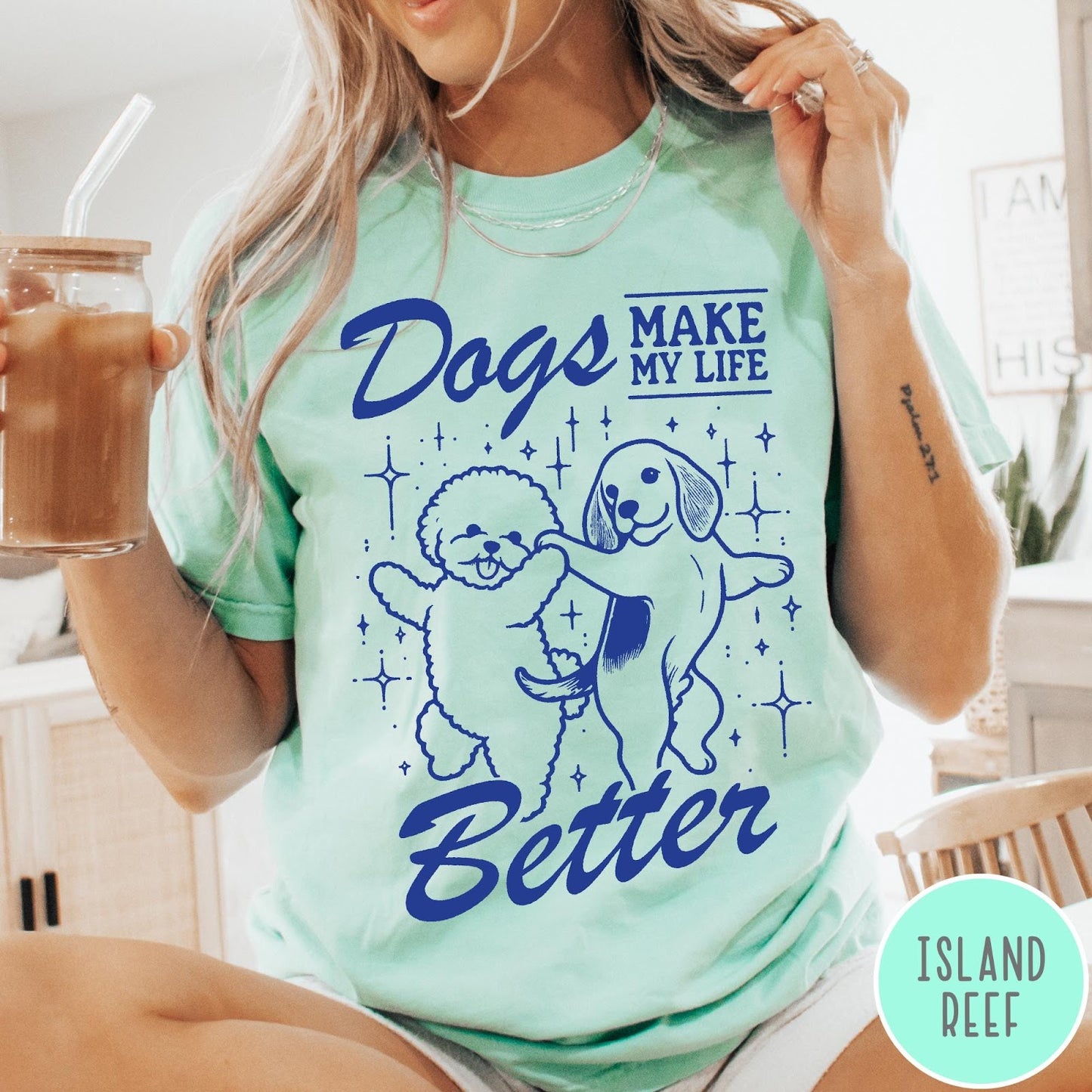 Comfort Colors tee in Island Reef featuring line art graphic of two dogs dancing with stars and text