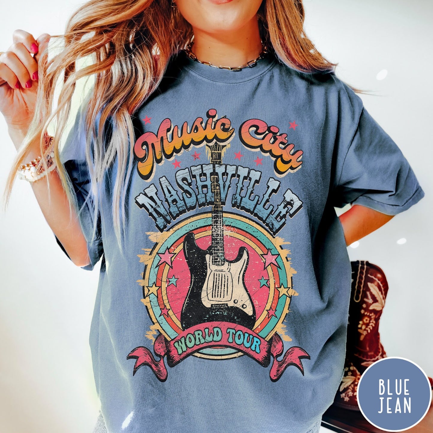 Comfort Colors tee in Blue Jean featuring retro style Nashville Music City guitar graphic with colorful circular design