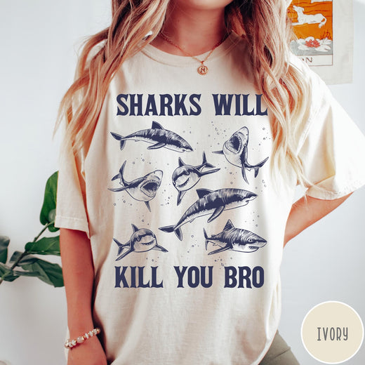 Comfort Colors tee in Ivory featuring illustrative style graphic of multiple sharks and text Sharks Will Kill You