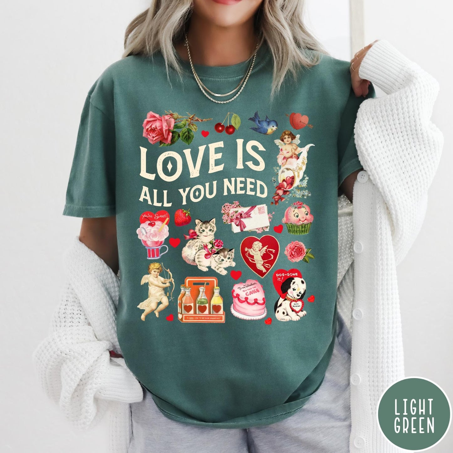 Comfort Colors tee in Light Green featuring Valentine's Day collage with kittens, cherubs, roses, and vintage graphic elements