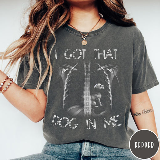 Comfort Colors tee in Pepper featuring graphic style X-ray ribcage with a small dog sitting inside.