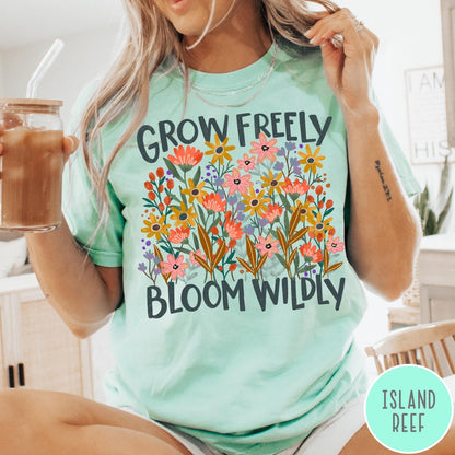 Comfort Colors tee in Island Reef featuring wildflower design with colorful flowers and Grow Freely Bloom Wildly text
