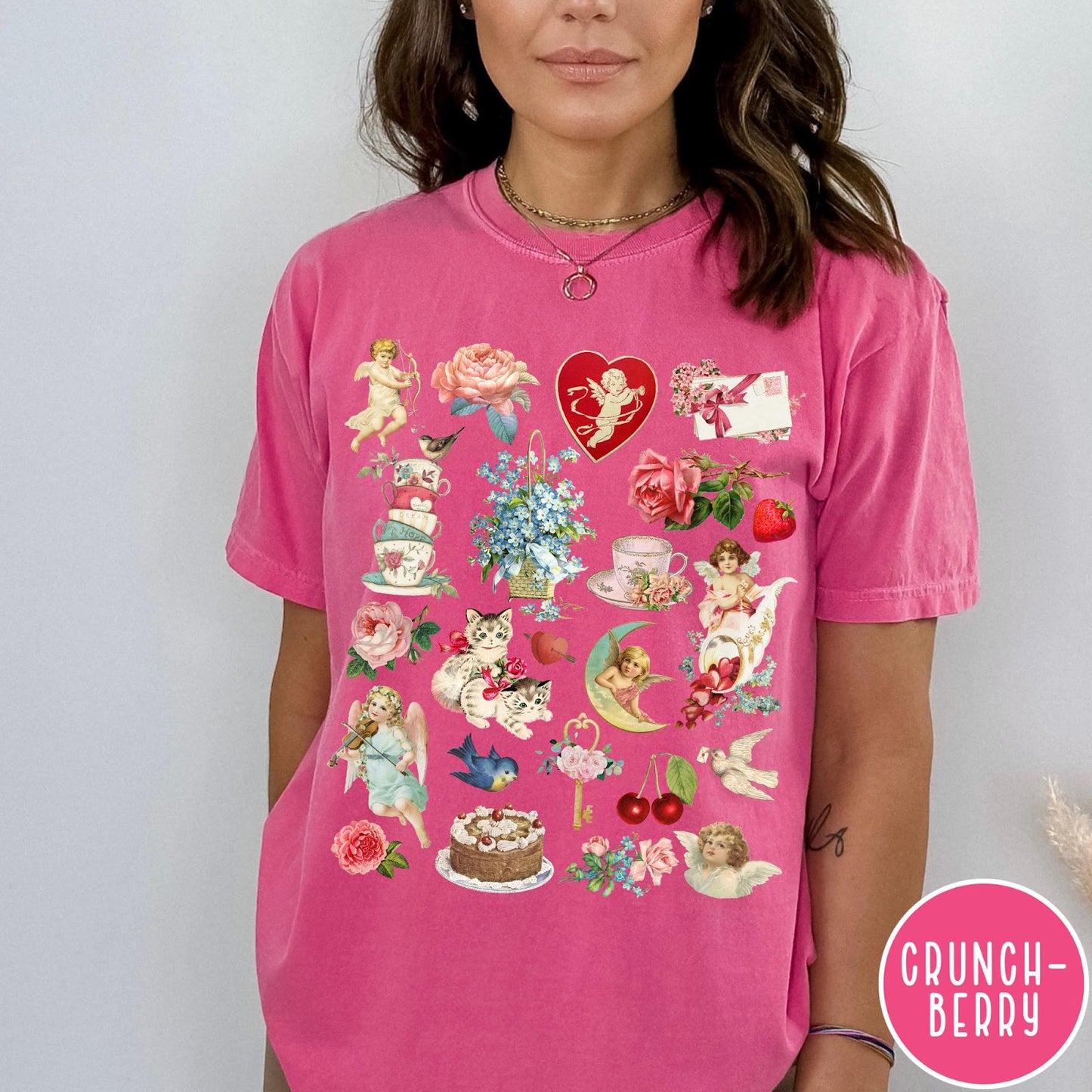 Comfort Colors tee in Crunchberry featuring vintage Valentine collage graphic with cherubs, flowers, cats, and romantic symbols