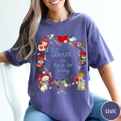 Comfort Colors tee in Grape featuring vintage Valentine's collage with cute animals, flowers, and romantic text.